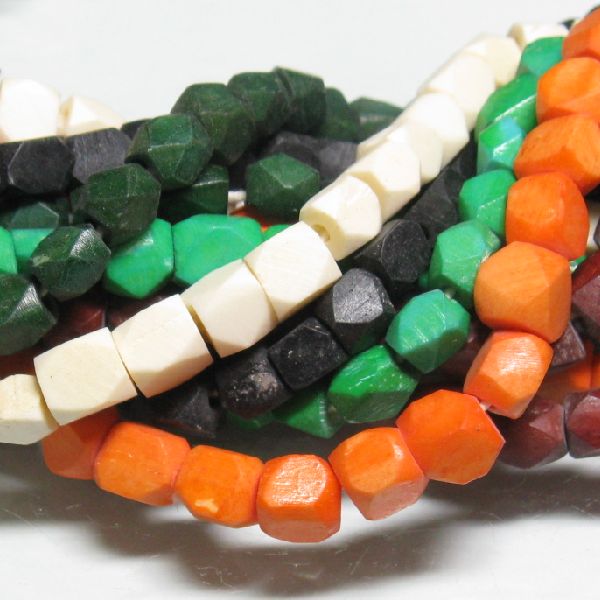 08-031| TOKO-BEADS | Multi-faceted cut bone beads